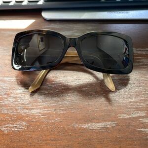Miu Miu SMU 14G 3AK 3N1 135 brown leopard print sunglasses